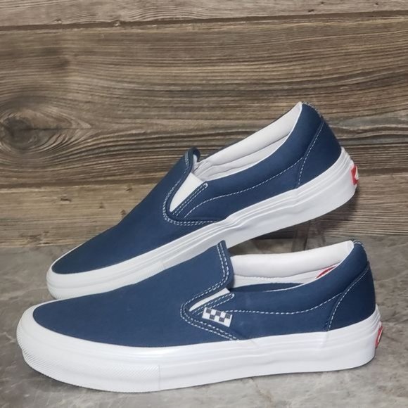 Dark blue deals vans slip ons